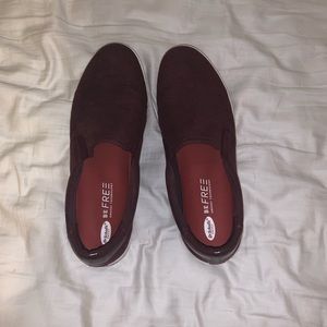 Burgundy slip on shoes.
